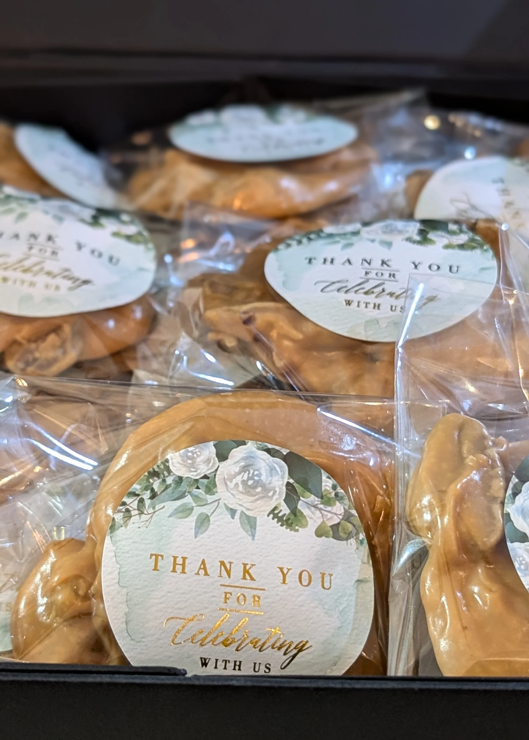 Packaged pralines with 'Thank You' labels